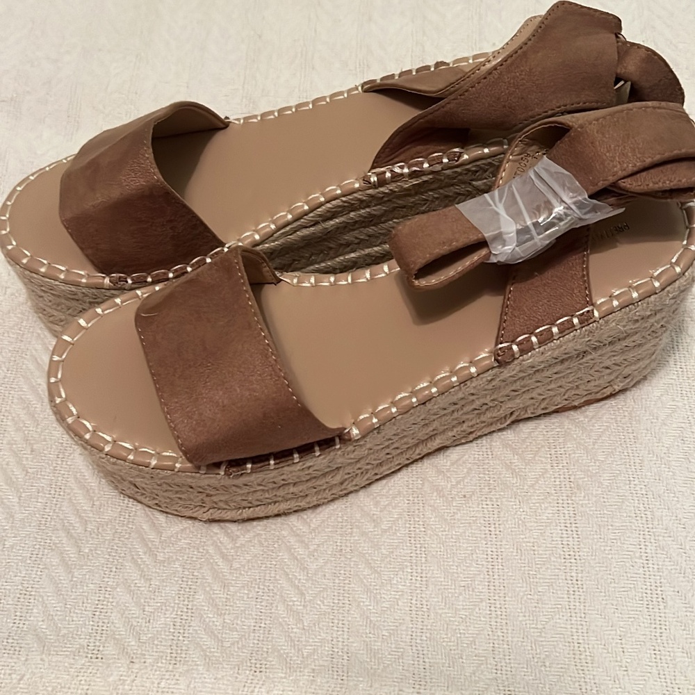 Never worn PLT platform sandals size 8